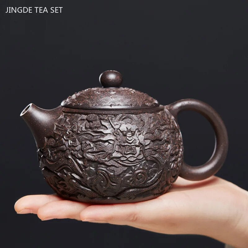 http://www.aookmiya.com/cdn/shop/files/300ml-Yixing-Handmade-Purple-Clay-Tea-Pot-Raw-Ore-Black-Gold-Sand-Xishi-Kettle-Master-Authentic_1200x1200.jpg?v=1697882035