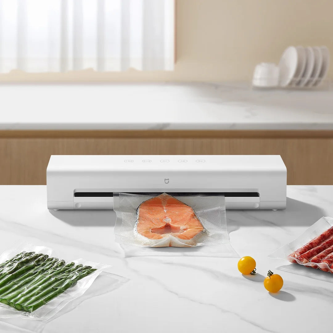 http://www.aookmiya.com/cdn/shop/files/Xiaomi-Mijia-Intelligent-Automatic-Vacuum-Sealing-Machine-70kPa-Large-Suction-Insect-proof-Moisture-proof-Quick-Vacuum_733930de-149a-4360-911f-1bffcc9bc13f_1200x1200.webp?v=1702838924