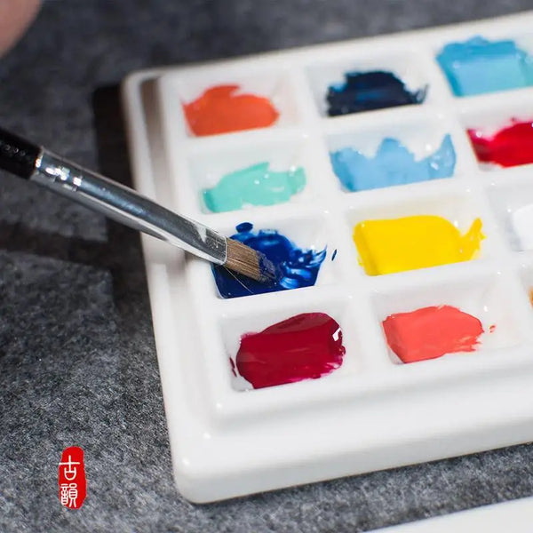 PALETTE OF 12 GOUACHE PAINTS